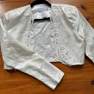 Scott Mcclintock white lace over coat.